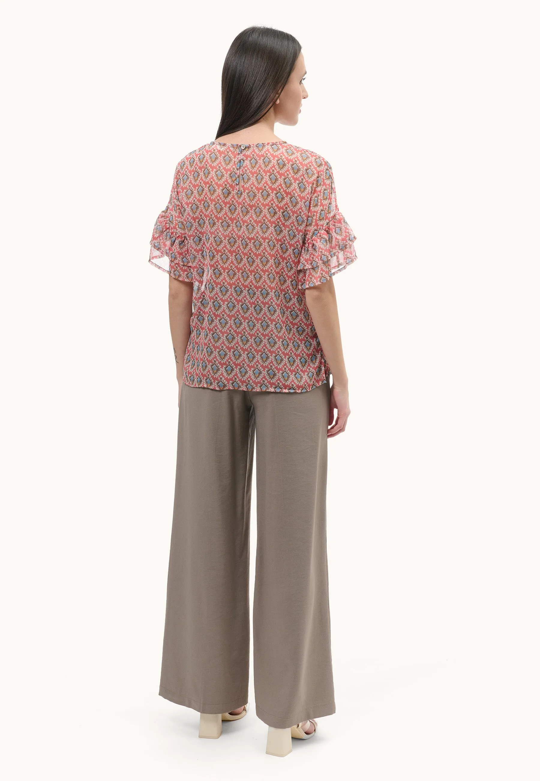Blusa in fantasia astratta rombi