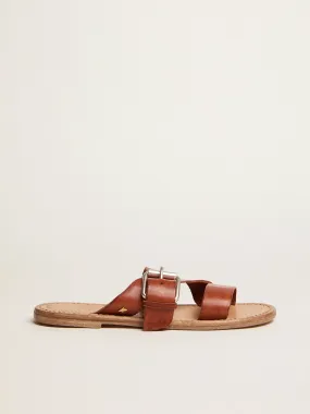 Margaret flat sandals in resin-coated leather