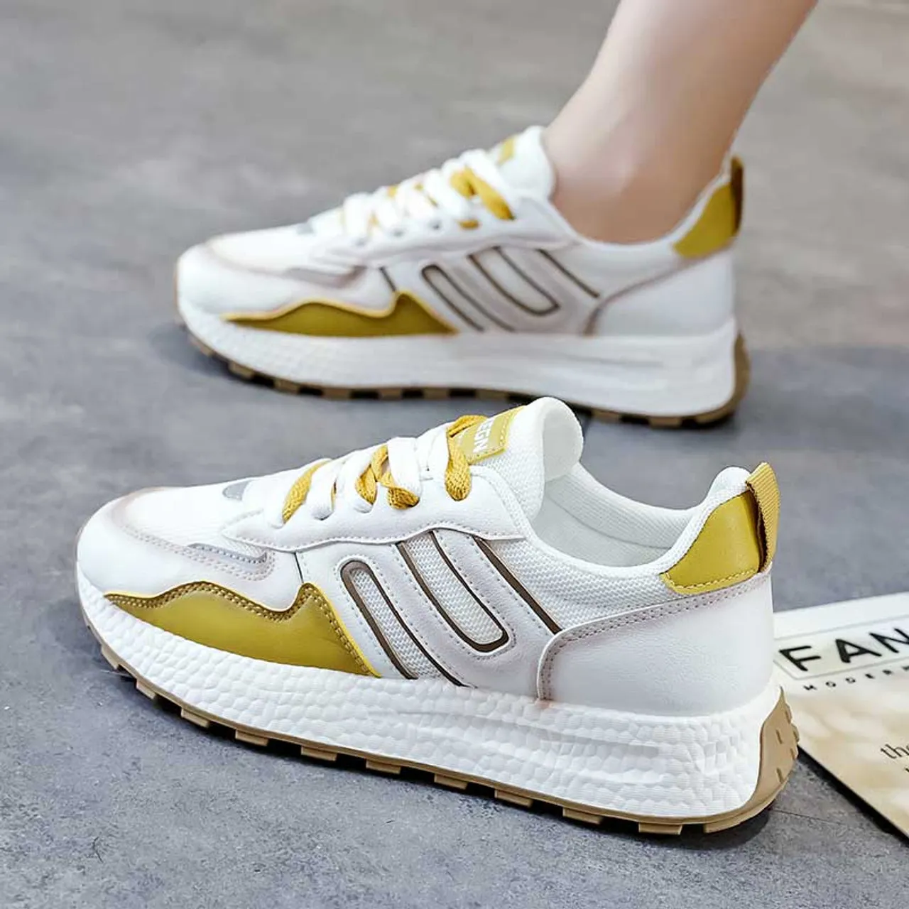 White yellow label pattern casual shoe sneaker