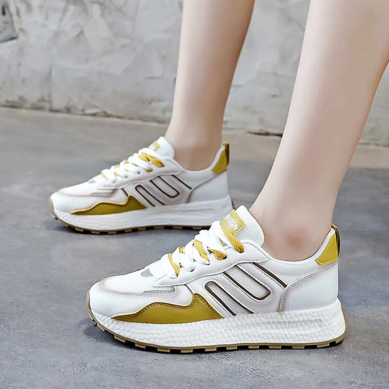 White yellow label pattern casual shoe sneaker