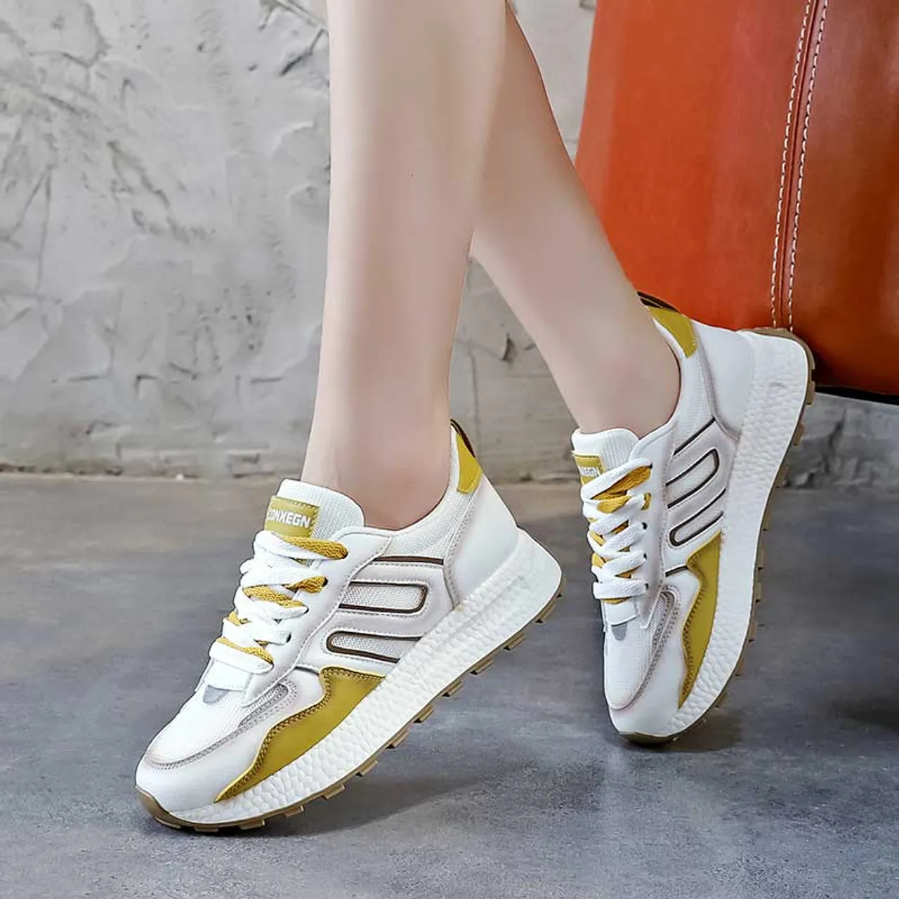 White yellow label pattern casual shoe sneaker